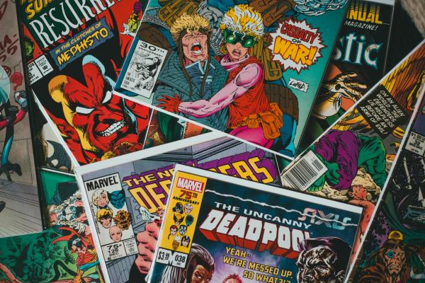 A collection of colourful superhero comic books.